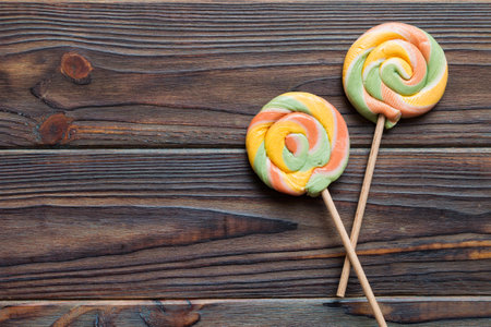 Set of colorful lollipops on colored background. Summer concept. Party Happy Birthday or Minimalist Concept.の写真素材