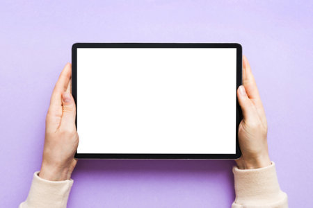 female teen hands using tablet pc with white screen, Mockup image of woman hand holding white tablet...