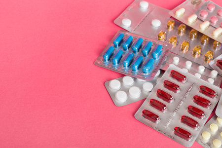 too many different pills of various blisters with different pills Medicines storage at home concept Medication storing. A pile of medicine in blister packs. Pharmaceutical blister packs.の写真素材