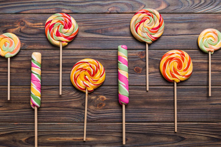 Set of colorful lollipops on colored background. Summer concept. Party Happy Birthday or Minimalist Concept.の写真素材