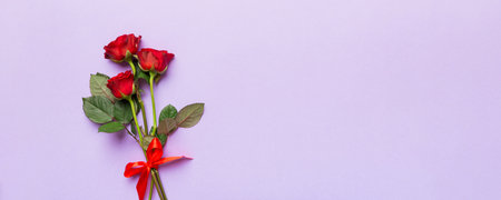 Valentine day composition with rose flower and red heart on table. Top view, flat lay, copy space Holiday concept.の写真素材