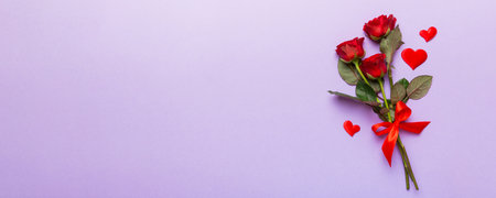 Valentine day composition with rose flower and red heart on table. Top view, flat lay, copy space Holiday concept.