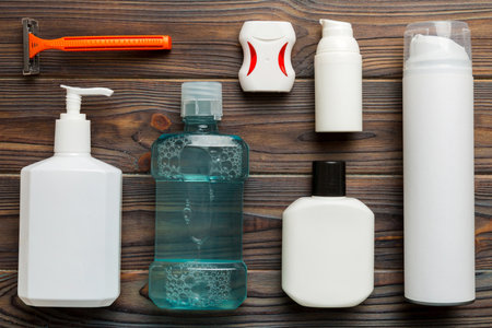 Mockup for bathing products top view flat lay, spa razor, toothpaste, soap, gel and other various...