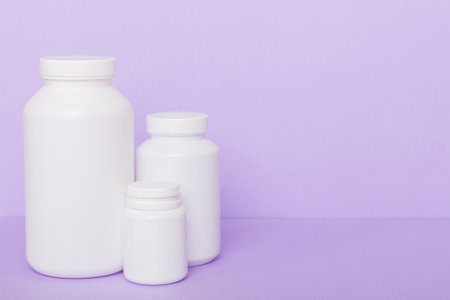 supplement pills with medicine bottle health care and medical top view. Vitamin tablets. Top view...