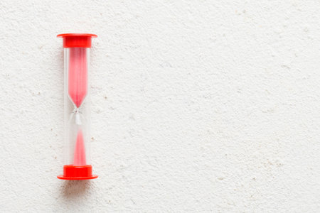hourglass on the table, sand clock as time passing concept for business deadline, copy space.