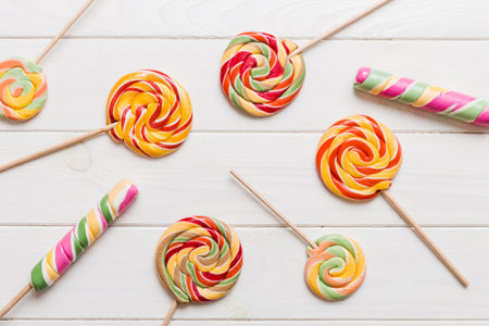 Set of colorful lollipops on colored background. Summer concept. Party Happy Birthday or Minimalist...