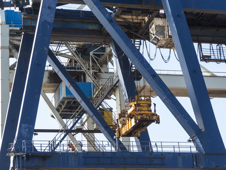 Container crane at dockside in harbor  detail.