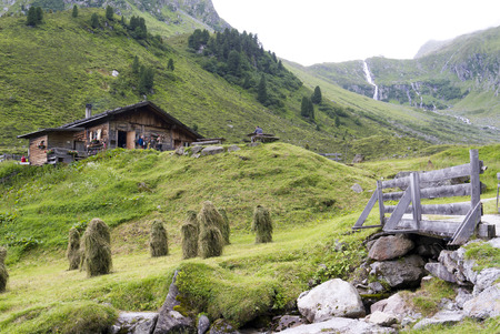 Scenic Tirol alp in summertime at harvest time.のeditorial素材