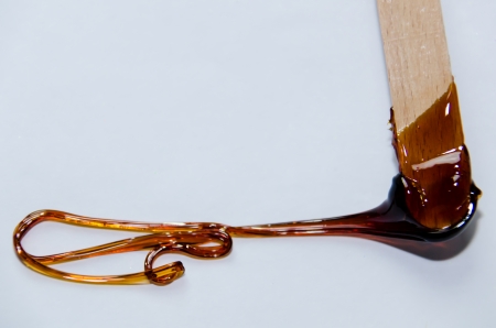 Wax on a wooden tool の写真素材