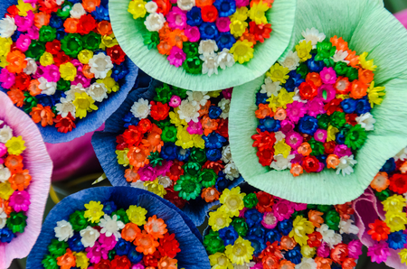 Flowers wraped in colorful paper の写真素材