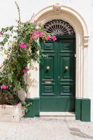 people in Malta paint their doors all kind of beautiful colors and use very interesting architecture so their houses are uniqueの写真素材