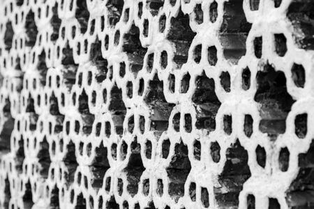 Geometrical clay tiles wall background. Eastern ornament. Element of decorative wall