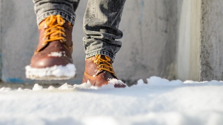 A man walks in the snow. Winter walks conceptの写真素材