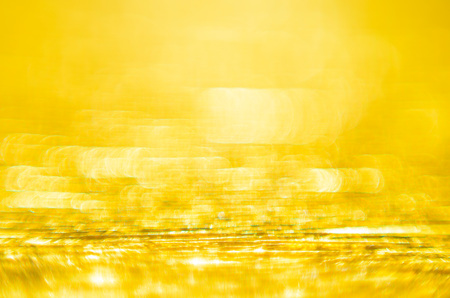 Gold Texture of Embossed Paper. Gold Paper Texture Background. Macro. Shallow depth of field. Abstract background with deep grooves in the texture of corrugated paperの写真素材