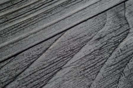 Very dark texture of black shine woodの写真素材