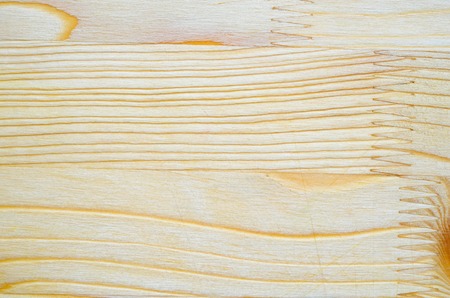The texture of the glued board. Glued furniture board background. Natural sawn timber textureの写真素材