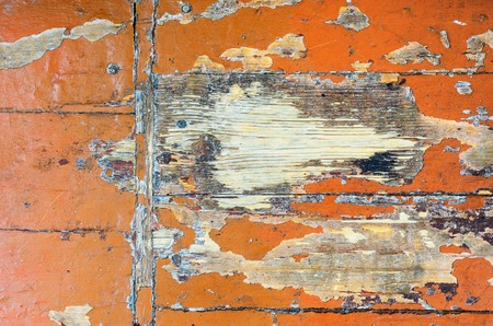 Texture of old dilapidated wooden floor with brown peeling paint. Exfoliated Paint on an Old Wooden Floor. Shabby Backgroundの写真素材