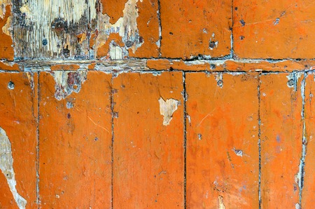 Texture of old dilapidated wooden floor with brown peeling paint. Exfoliated Paint on an Old Wooden Floor. Shabby Backgroundの写真素材