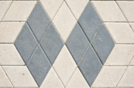 Gray Concrete Rhomboid Shape Paving Stone Texture. Sidewalk Background Conceptの写真素材