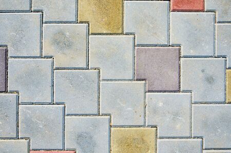 Multicolored Sidewalk Tile Texture. The Texture of Artificial Stone Pavers of Different Colors