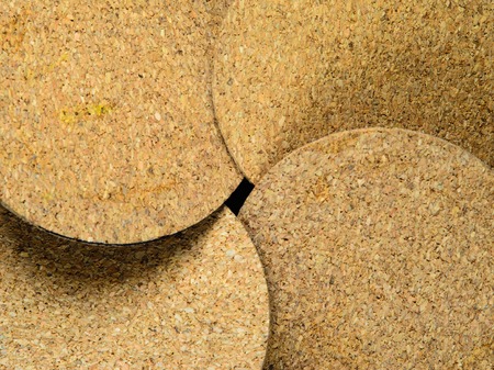 Cork coasters for mugs as backgroundの写真素材