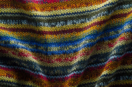 Colorful Knit Fabric Texture. Folds on of Knitted Sweater Cloth. Blank Background