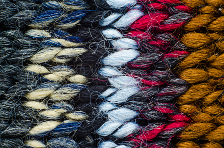 Colorful Knit Fabric Texture. Macro View of a Knitted Sweater. Blank Backdropの写真素材