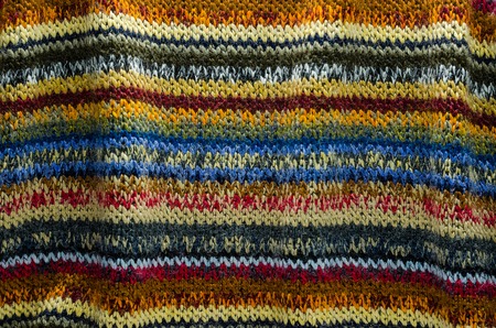 Colorful Knit Fabric Texture. Folds on of Knitted Sweater Cloth. Blank Backgroundの写真素材