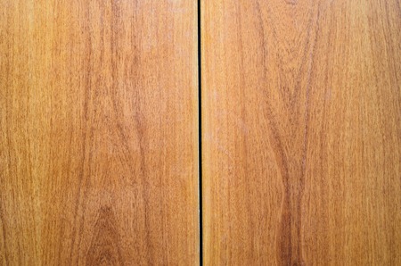 Book-Matched Wood Panels Background. Joints of Decorative Finishing from Wood Panels on Interior, Exterior Walls or Kitchen Facades. Mirror Matching Pattern of Two Wood Wallboardsの写真素材