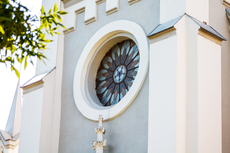 Multicolored stained glass round rose window Gothic style. Catholic Church in the Gothic styleの写真素材