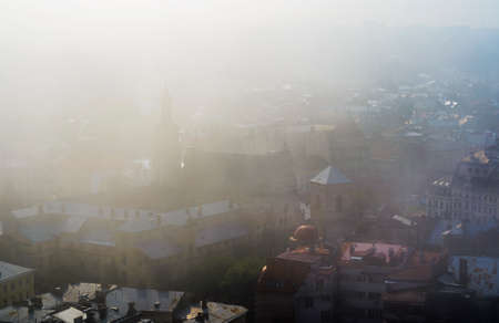 Lviv, Ukraine- September 1, 2018: Foggy Morning of the City Center from Town Hall Tower. The Bernardine Church and Monastery in Lvivのeditorial素材