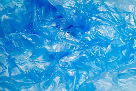 Blue Plastic Bag Texture. Abstract Wrinkled Background of Plastic Garbageの写真素材