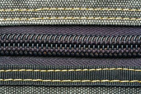 Zipper in gray sports backpack. Sports bag accessories backgroundの写真素材