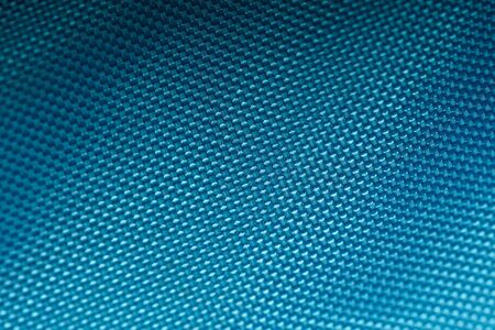Blue Nylon Fabric Texture Background. Thick Fabric for Backpacks and Sports Equipmentの写真素材