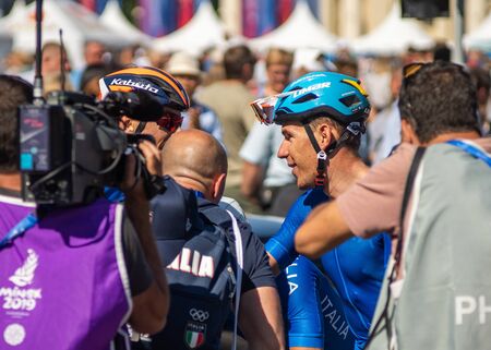 Minsk, Belarus - 23 Jun 2019: The cycling competitions of the 2019 2nd European Games in Minsk, men's road race. Group bicycle race for 180 km through the streets of city. Italy Winner BALLERINI Davideのeditorial素材