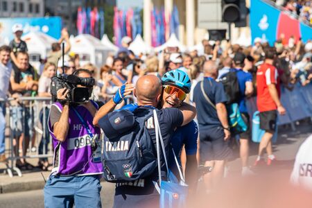 Minsk, Belarus - 23 Jun 2019: The cycling competitions of the 2019 2nd European Games in Minsk, men's road race. Group bicycle race for 180 km through the streets of city. Italy Winner BALLERINI Davideのeditorial素材