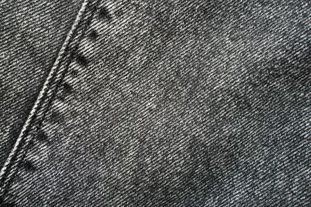 Texture of cotton fabric. Gray denim fabricの写真素材