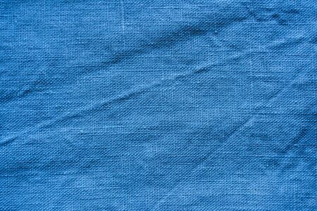 Blue linen cloth texture. Natural fabric material backgroundの写真素材