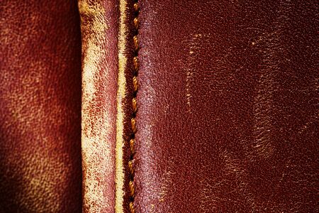 Detail of an old leather bag briefcase close upの写真素材