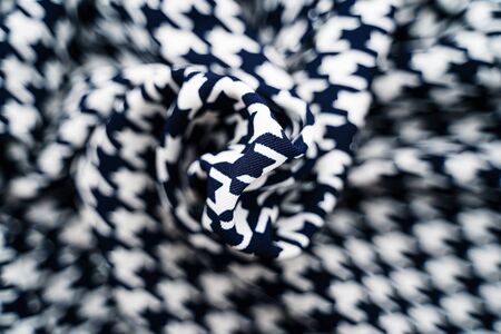 Fabric with goose foot pattern. Crumpled fabric background