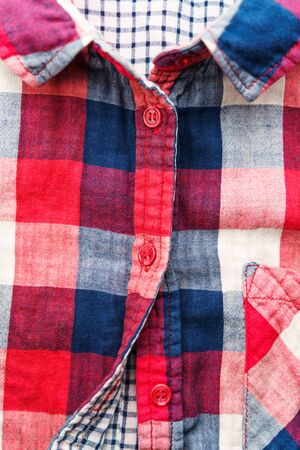 Plaid Material Shirt Background. Front of Shirt Elements: pocket, collar, buttons as Background