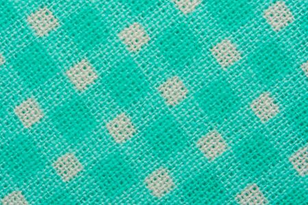 White and green cage clothes background macroの写真素材