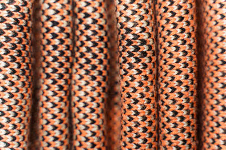 Background of red synthetic knitted fabric