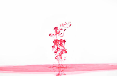 Pink ink isolatedの写真素材