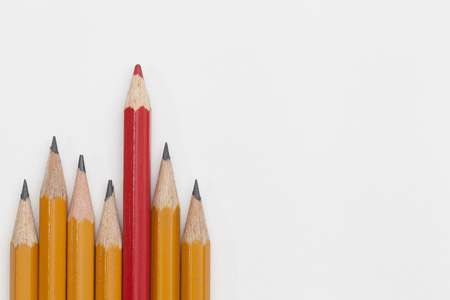 red and yellow pencils on white backgroundの写真素材