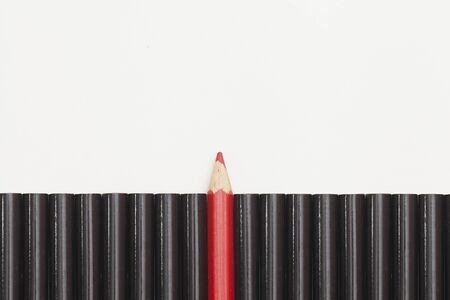 the concept of pencils. Red among the blackの写真素材
