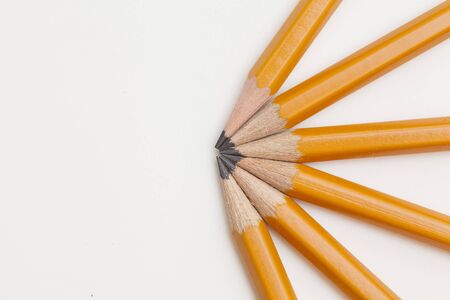 yellow pencils on white backgroundの写真素材