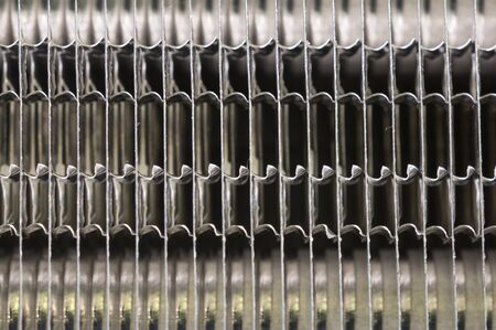 Details of the car engine radiator. Macro close-up of the radiator plates.