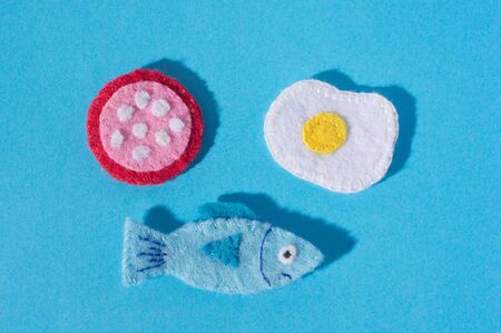 The composition of crafts made of felt  in the form of food. Hobbies and colorful crafts. View from...