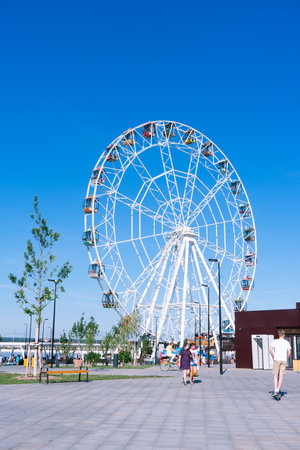 Cheboksary, Chuvashia/ Russia - August 15 2021: ferris wheel and the square in front of itのeditorial素材